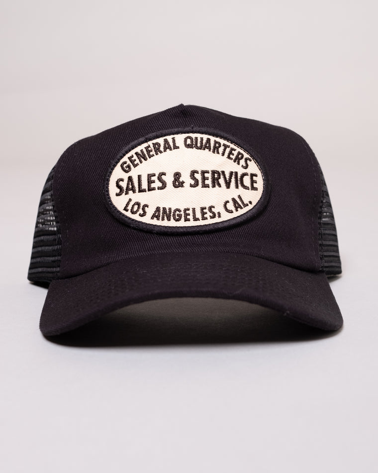 Unstructured Service Trucker Hat in Black