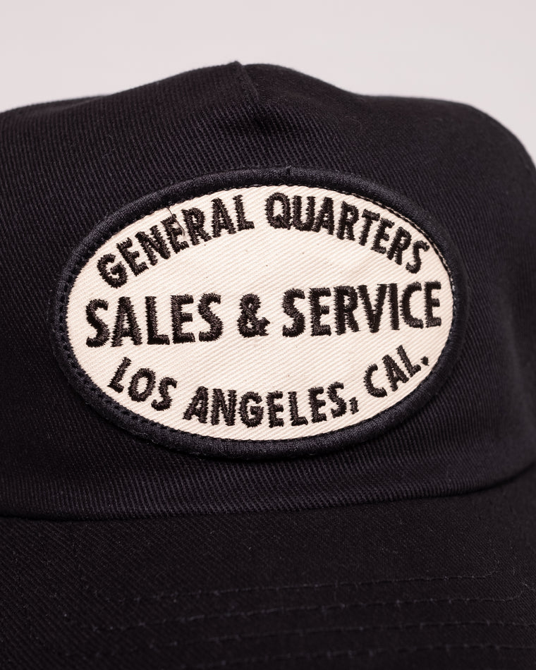 Unstructured Service Trucker Hat in Black